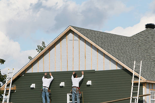 Professional Storm Damage Siding Repair technician working in Farmington, CT